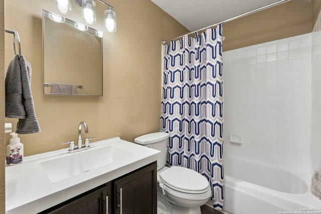 bathroom featuring toilet, a textured ceiling, shower / tub combo with curtain, and vanity