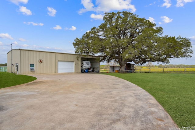 exterior space featuring fence and an outdoor structure