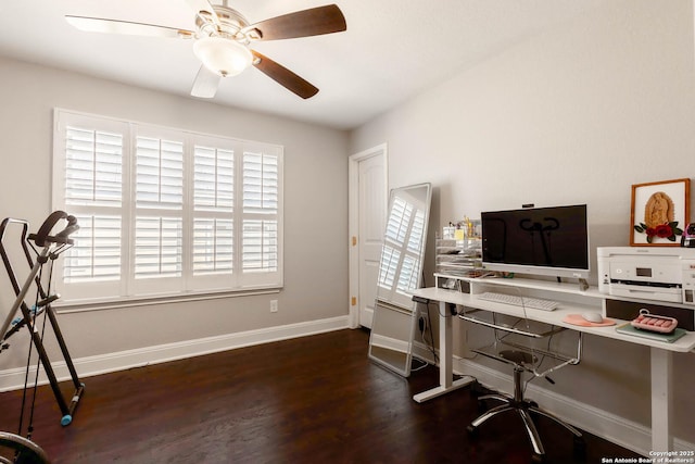 office area featuring ceiling fan, wood finished floors, and baseboards