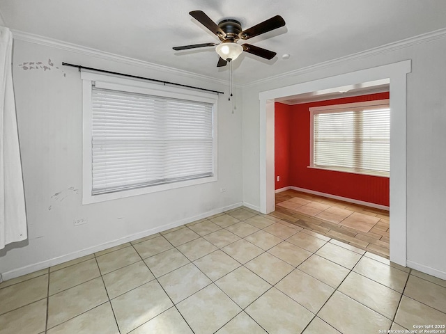 empty room featuring ornamental molding, a ceiling fan, and baseboards