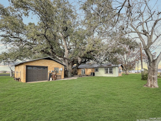 exterior space with driveway and an outdoor structure