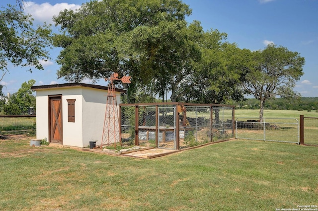 view of shed featuring fence