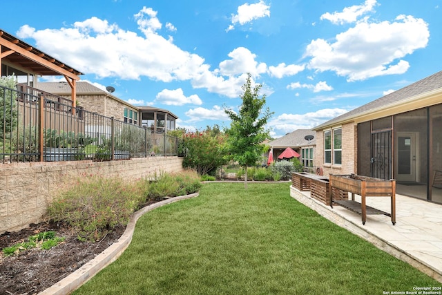 view of yard featuring a patio and a fenced backyard