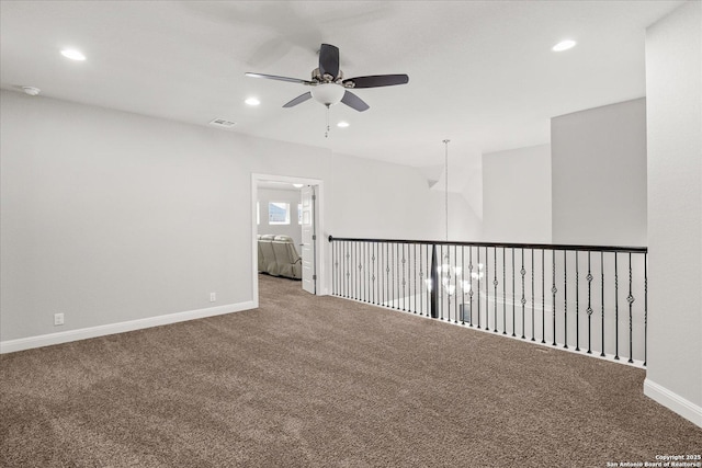 unfurnished room featuring carpet and recessed lighting