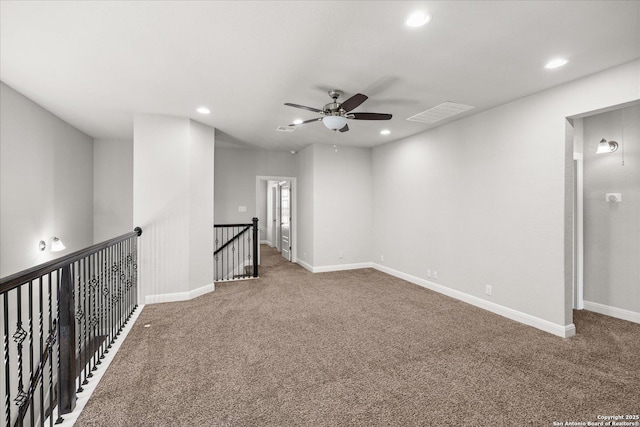 unfurnished room with carpet floors, recessed lighting, ceiling fan, and baseboards