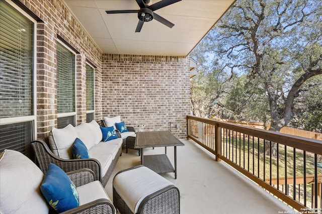 balcony featuring outdoor lounge area and ceiling fan