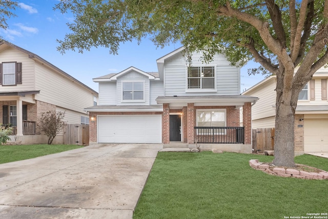 traditional-style home with a garage, driveway, brick siding, and fence