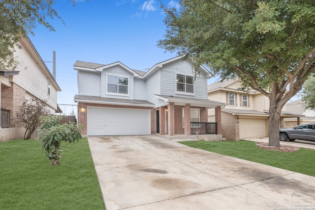 traditional-style home featuring a garage, covered porch, brick siding, concrete driveway, and a front yard