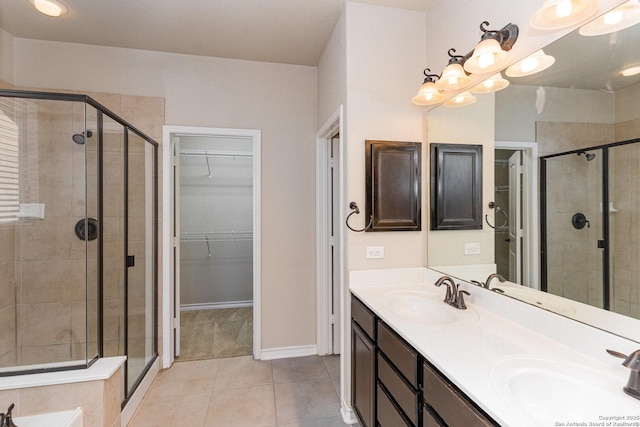 full bathroom with a shower stall and a sink