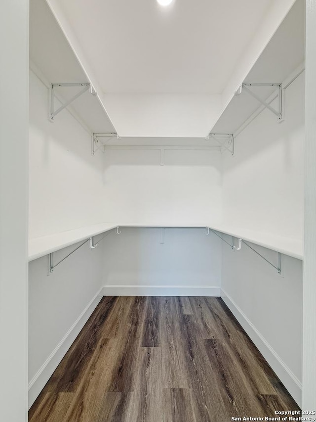 660 Skyline Dr, Bandera, TX 78003 - walk in closet featuring dark wood-style floors