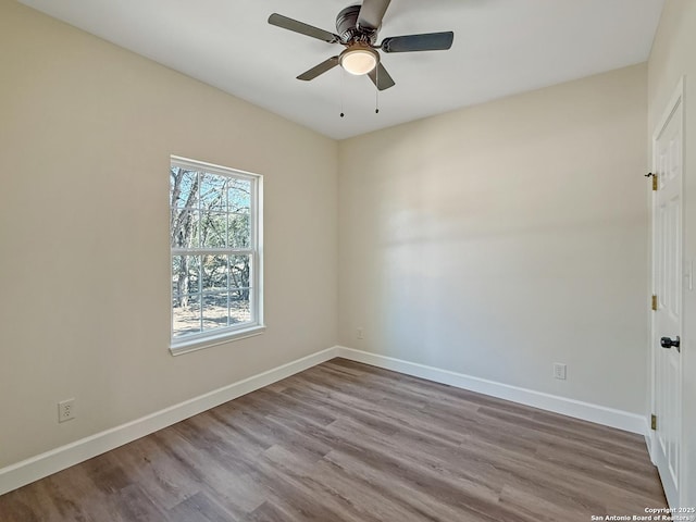 660 Skyline Dr, Bandera, TX 78003 - unfurnished room featuring ceiling fan, baseboards, and wood finished floors