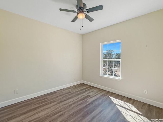 660 Skyline Dr, Bandera, TX 78003 - empty room featuring a ceiling fan, baseboards, and wood finished floors