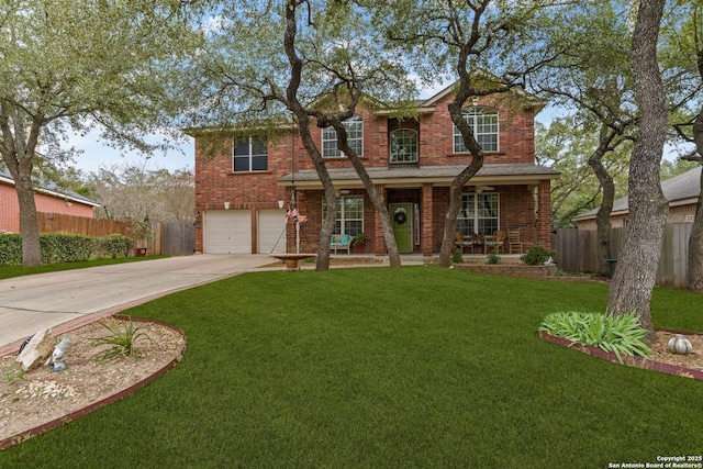 traditional-style home featuring covered porch, fence, concrete driveway, and brick siding