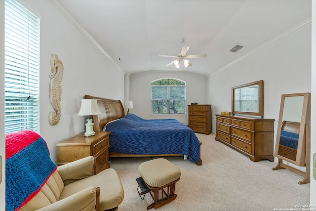 bedroom featuring ornamental molding, visible vents, vaulted ceiling, and light colored carpet