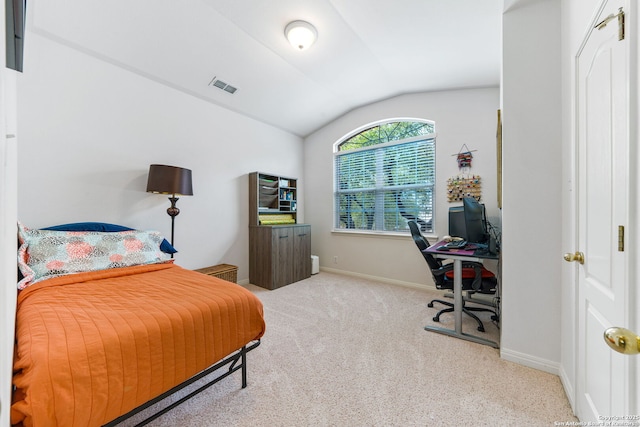 bedroom with lofted ceiling, baseboards, visible vents, and carpet