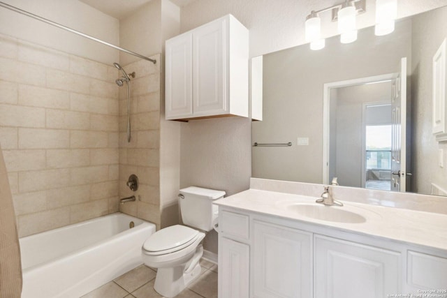 full bathroom with toilet, tile patterned flooring, washtub / shower combination, and vanity