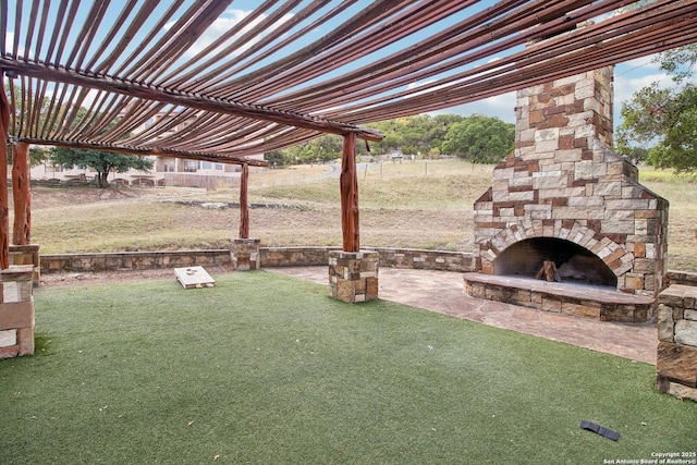 exterior space with an outdoor stone fireplace