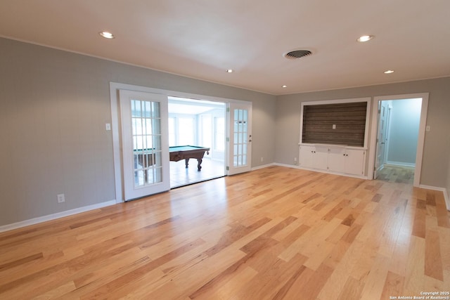 unfurnished living room featuring light wood-style flooring, recessed lighting, visible vents, and baseboards