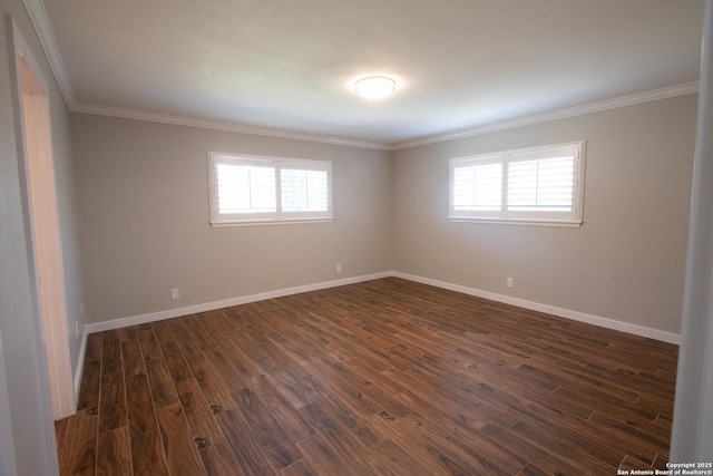 unfurnished room featuring a healthy amount of sunlight, baseboards, and dark wood finished floors