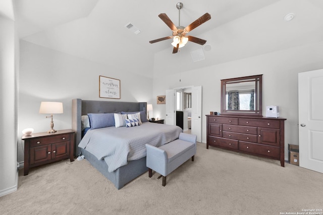 bedroom featuring a ceiling fan, light carpet, vaulted ceiling, and visible vents