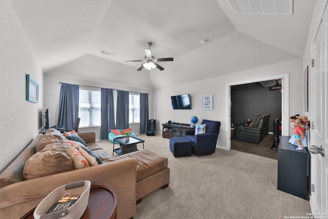 living room with light colored carpet, visible vents, ceiling fan, and lofted ceiling