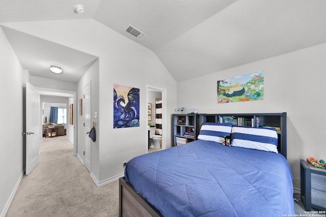 carpeted bedroom featuring baseboards, visible vents, vaulted ceiling, and ensuite bathroom