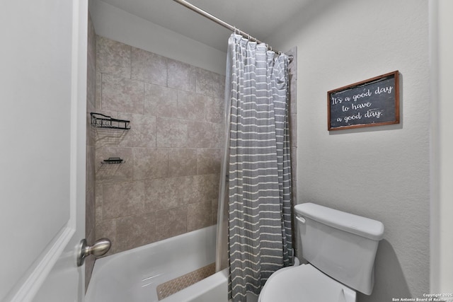 full bathroom with shower / bath combination with curtain and toilet