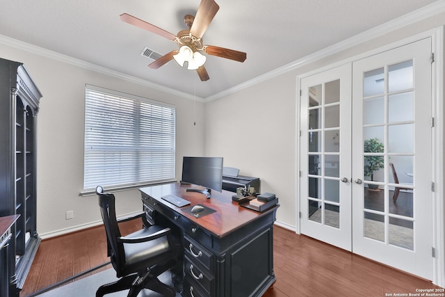 office space with ornamental molding, wood finished floors, and french doors