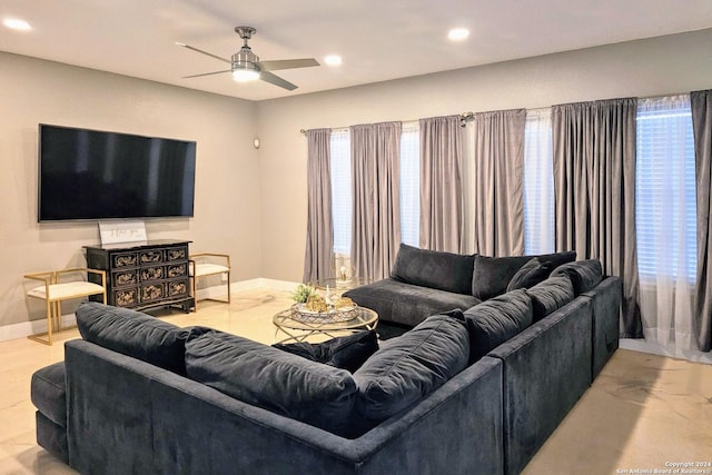 living room with ceiling fan, baseboards, and recessed lighting