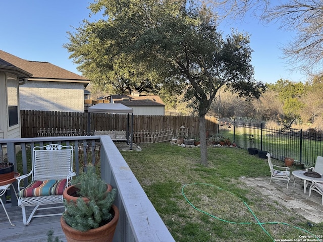 view of yard featuring a fenced backyard