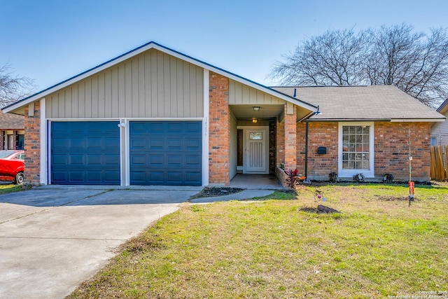 view of front of house with a garage, concrete driveway, brick siding, and a front yard