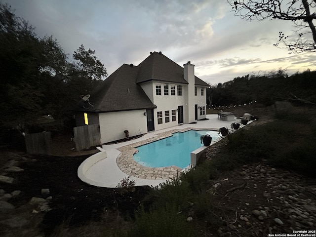 pool with a patio