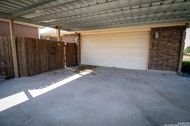 garage with fence