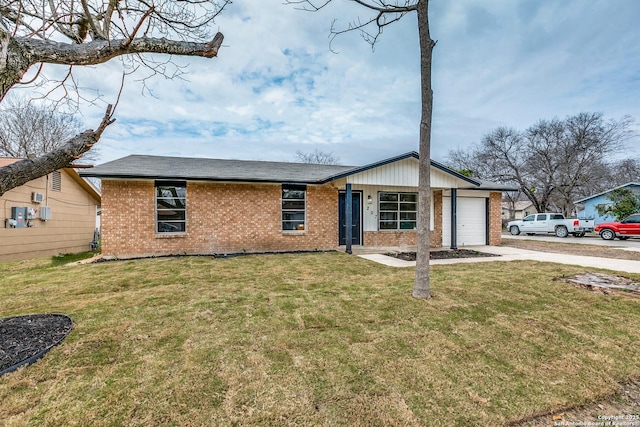 ranch-style home with a garage, driveway, brick siding, and a front lawn