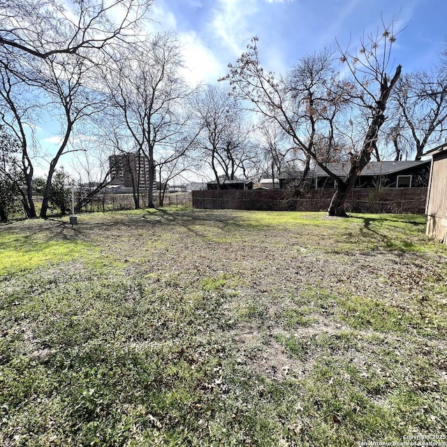 view of yard with fence