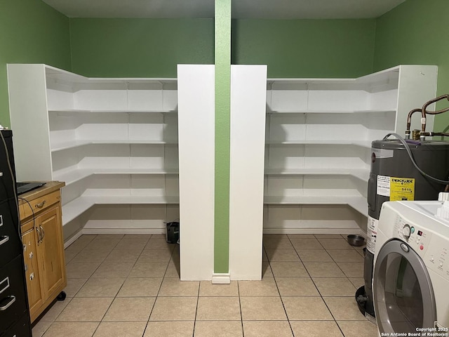 pantry with washer / dryer and electric water heater