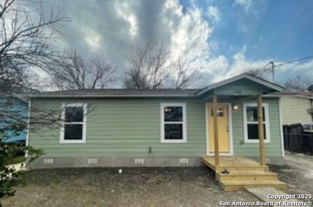 view of front of house featuring crawl space