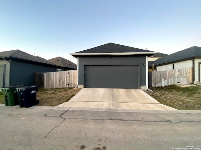 106 Tokalaun Dr, Hutto, TX 78634 - view of front of property with driveway, an attached garage, and fence