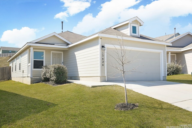 view of front facade featuring an attached garage, driveway, fence, and a front yard