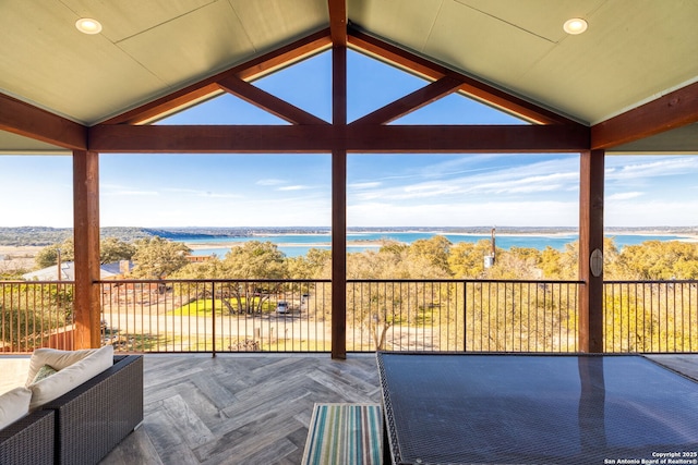 wooden terrace with a water view