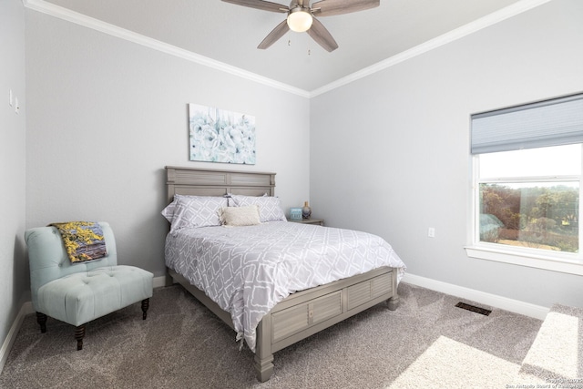 bedroom featuring baseboards, carpet, a ceiling fan, and crown molding