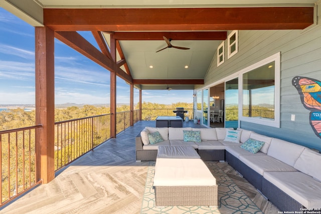 view of patio featuring a ceiling fan, grilling area, and an outdoor hangout area