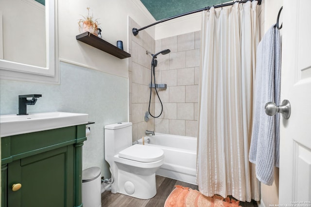 bathroom featuring vanity, shower / bath combo, wood finished floors, and toilet