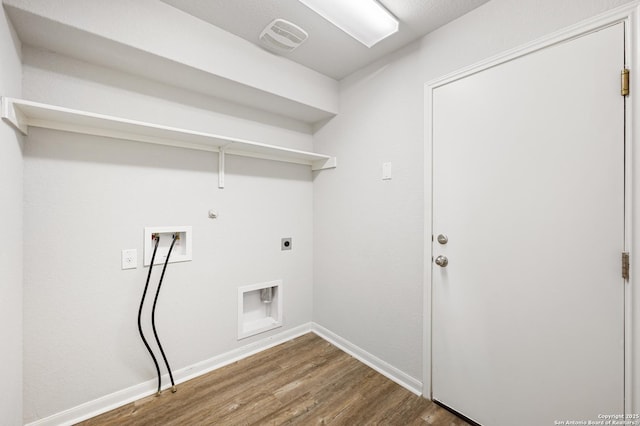 laundry room featuring hookup for a gas dryer, laundry area, washer hookup, dark wood-style floors, and electric dryer hookup