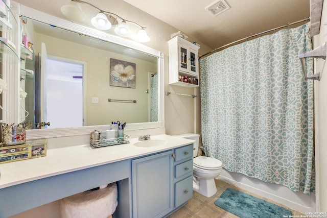 bathroom with shower / bath combination with curtain, visible vents, vanity, and toilet