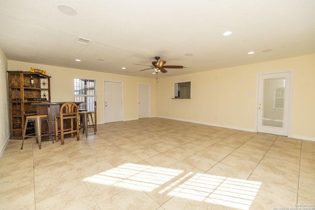 spare room with ceiling fan, light tile patterned floors, baseboards, and recessed lighting