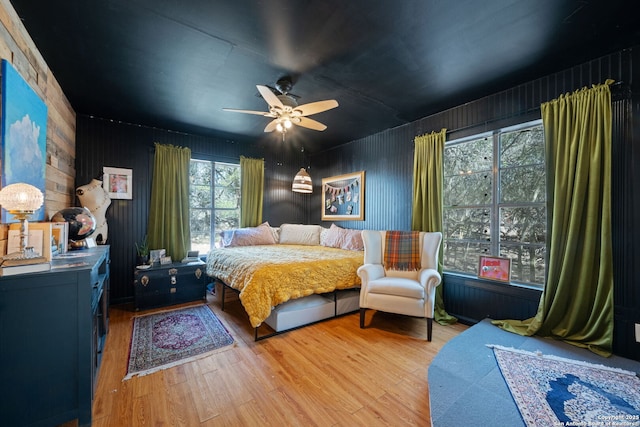 bedroom featuring light wood-style flooring and ceiling fan