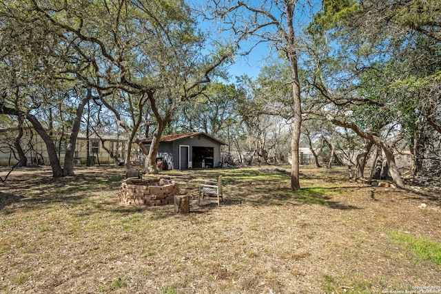 view of yard with an outbuilding and a pole building