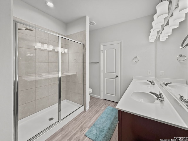 2832 Klein Way, New Braunfels, TX 78130 - full bath with toilet, a shower stall, visible vents, and a sink