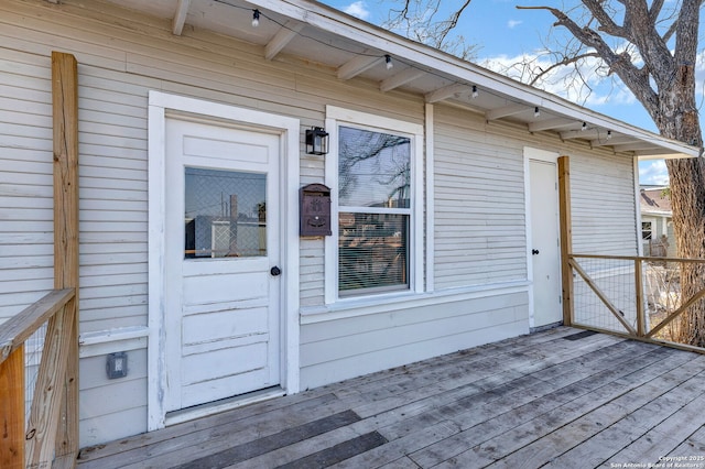 entrance to property featuring a deck